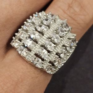 Oval cut Cubic Zirconia cluster band ring set in sterling silver. Size 7